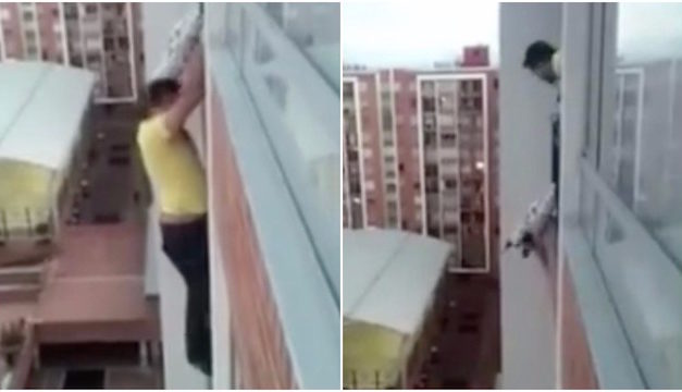 Man Climbs Out a Window 13 Floors High To Rescue Dangling Dog