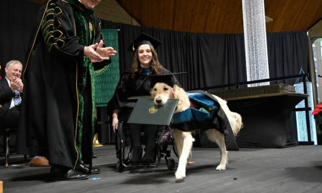 Service Dog Graduates From Grad School Together With Owner